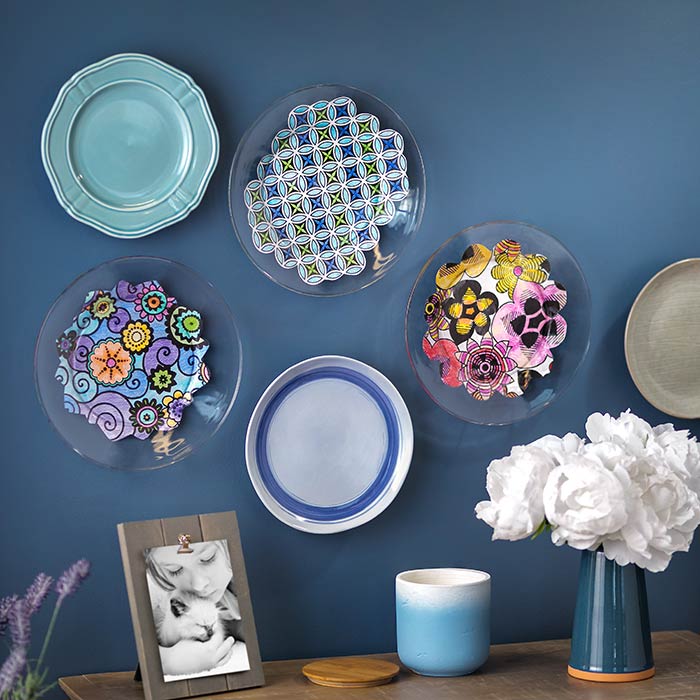 Coloring page decorative plates craft. Plates hanging on wall.
