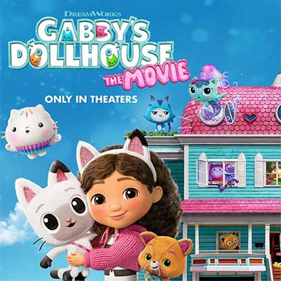 Gabby's and her cats in front of the dollhouse. 