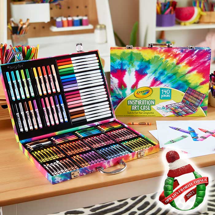 Inspiration art case, tie dye. packaging and contents on table.